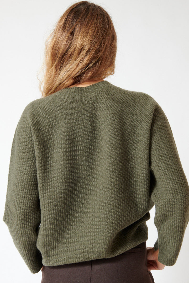 Mari wearing Pas de Calais Cashmere Blend Lambs Wool Patterned Knit Crewneck Pullover Khaki rear view