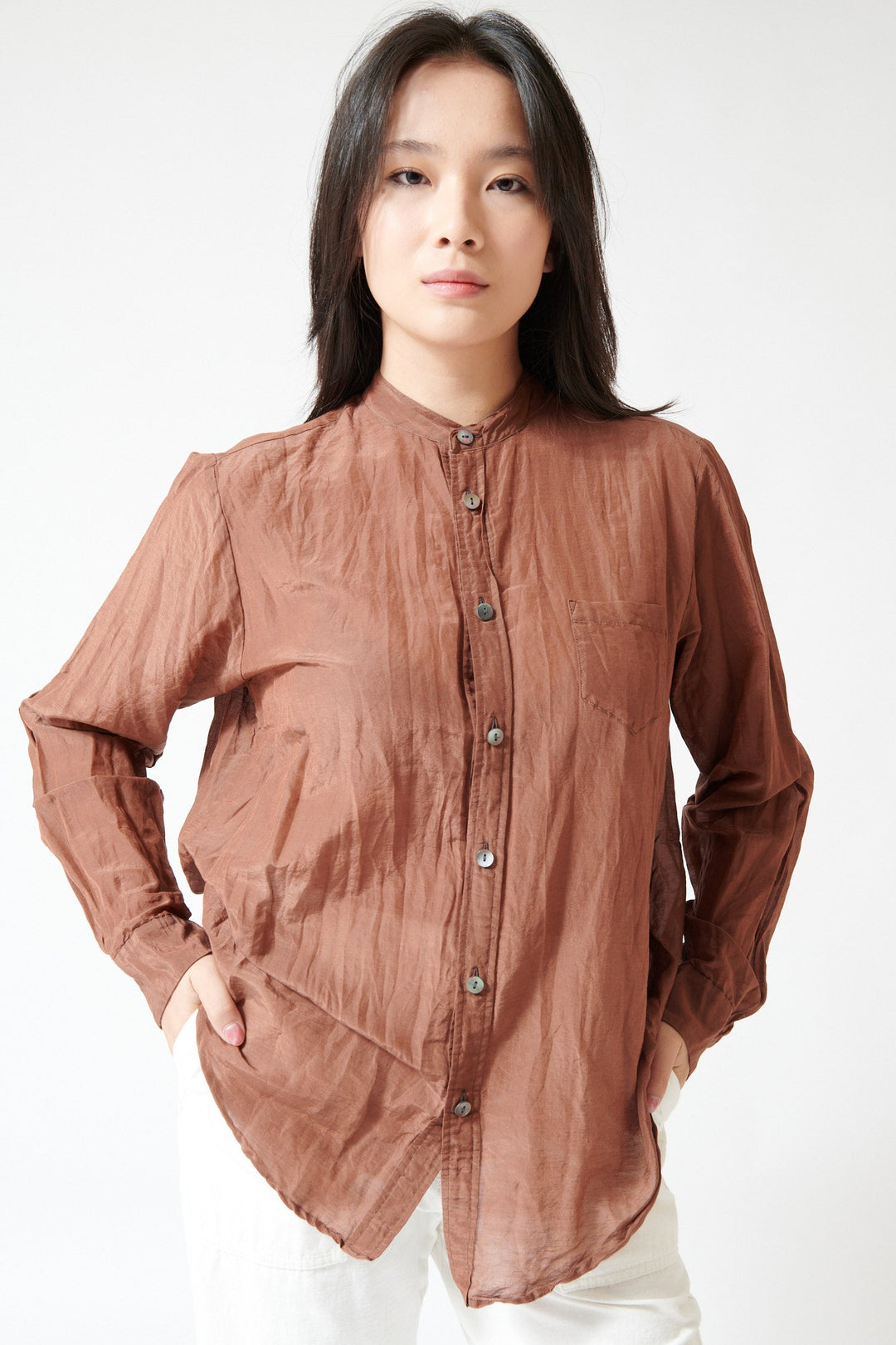 Lilly wearing Pas de Calais Cotton Silk Lawn Band Collar Shirt Coffee front view