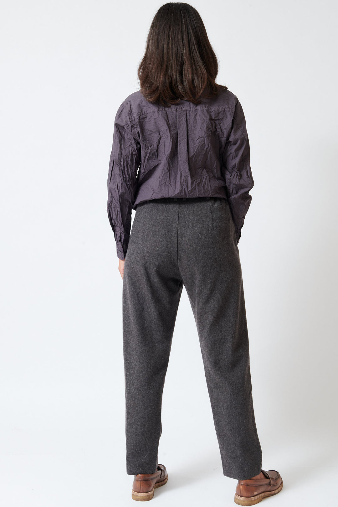 Model wearing Pas de Calais Eco Wool Premium Tweed Full Length Tapered Pants rear view