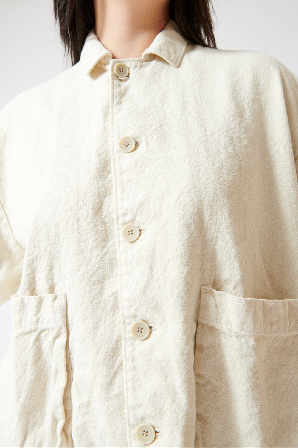 Lilly wearing Pas de Calais Natural Brushed Linen Cotton Twill Relaxed Coverall Jacket Natual front/detail view