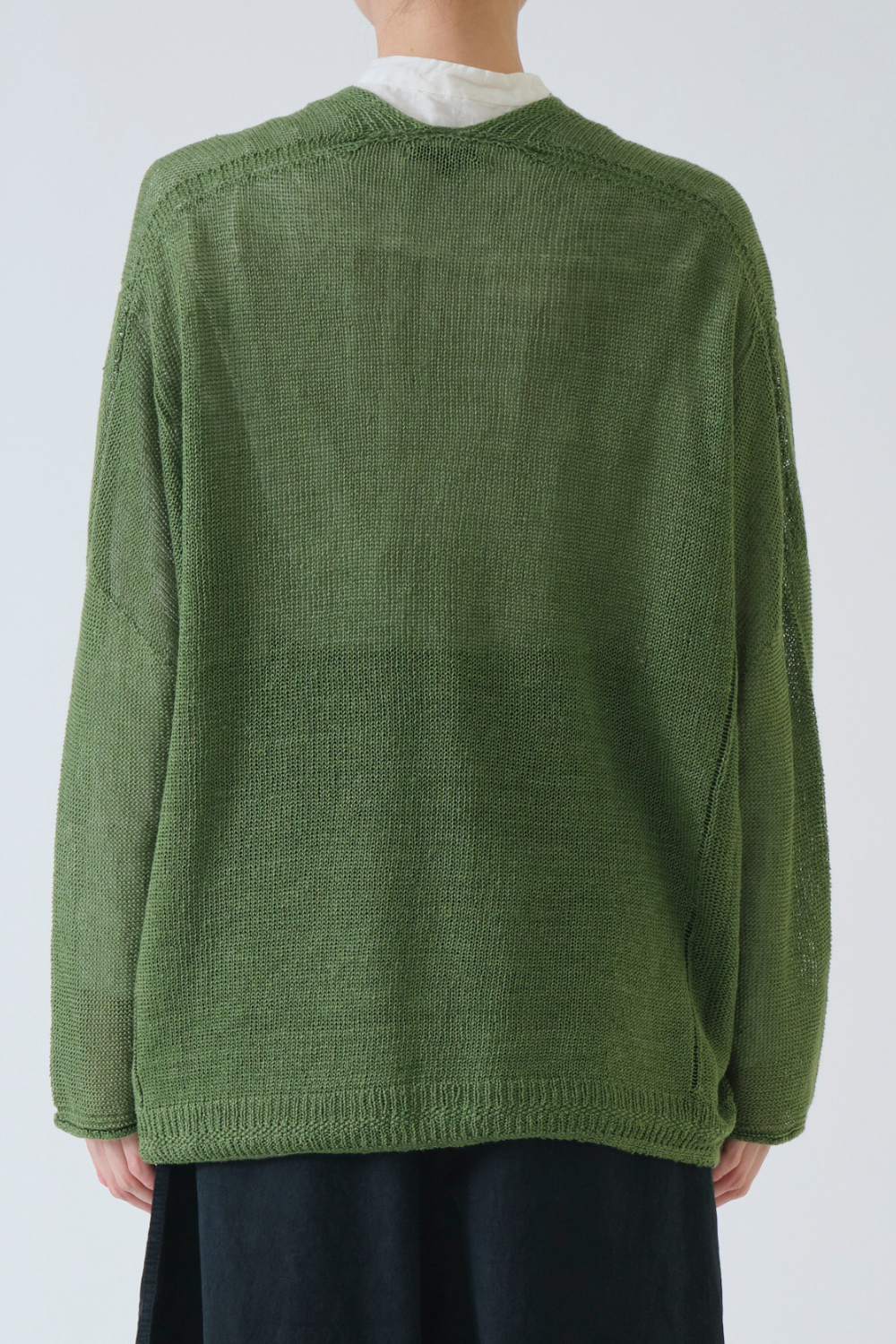 Model wearing Pas de Calais Normandy Linen V Neck Cardigan rear view