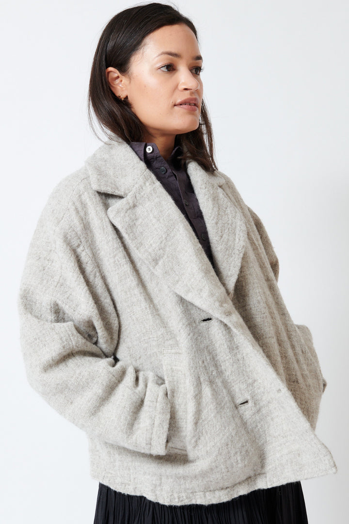 Model wearing Pas de Calais Shetland Wool and Normandy Linen Short Jacket side view