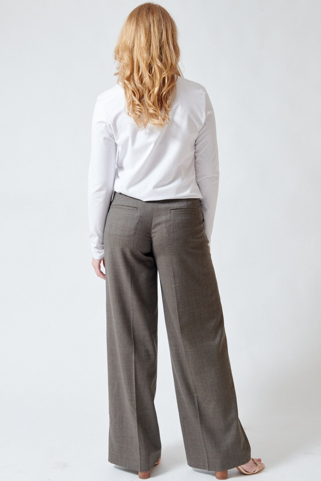 Model wearing Peserico Stretch Wool Blend Micro Pattern Flannel Pants rear view