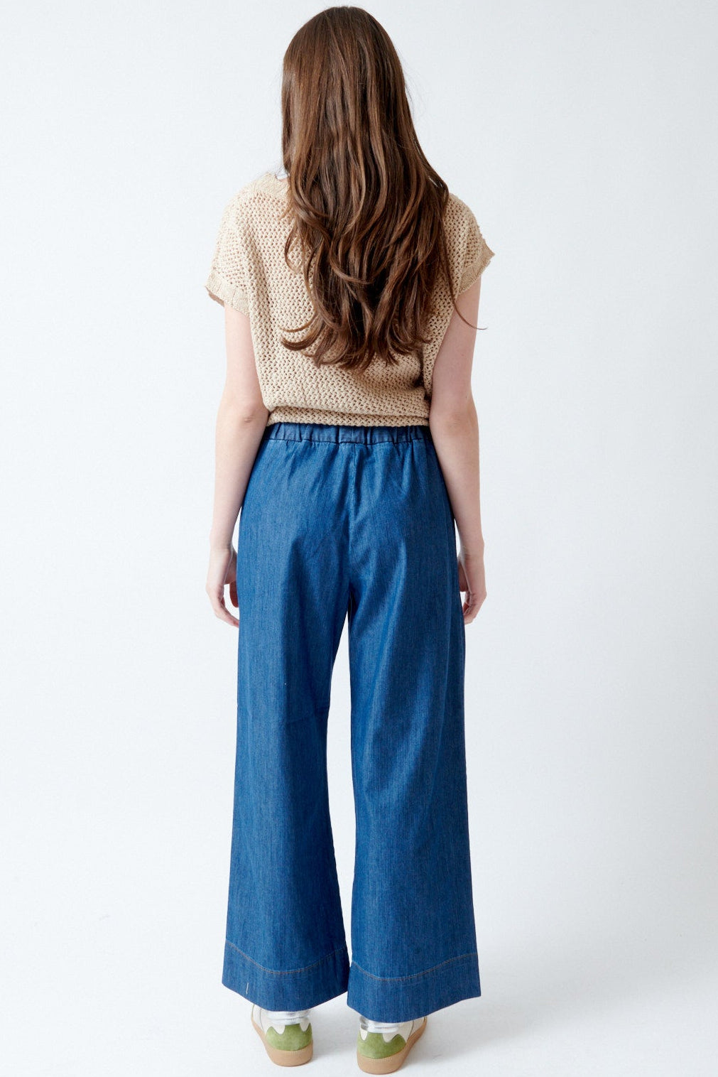 Angela wearing Rosso 35 Elasticated Wide Leg Jeans rear view