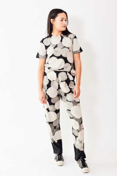 Model wearing Raquel Allegra Brooke pant in color Antique Black.