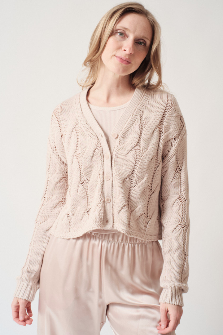 Madi wearing Sablyn Jolie D V Neck Cropped Cable Cardigan front view