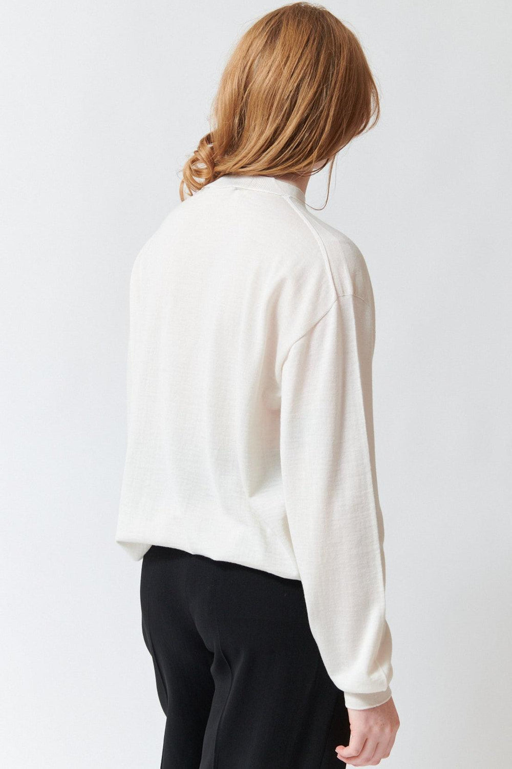 Waverly wearing Sofie D'Hoore Muscat Long Sleeve C Neck Pullover rear view