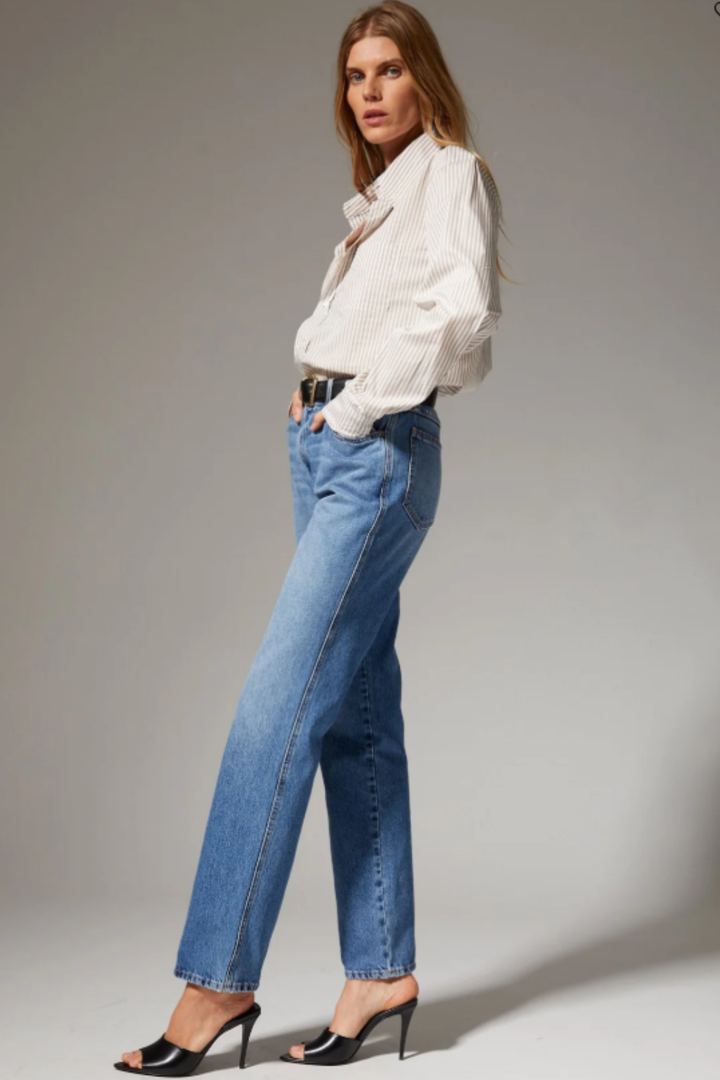 Model wearing SPRWMN Relaxed Straight Leg Denim side view