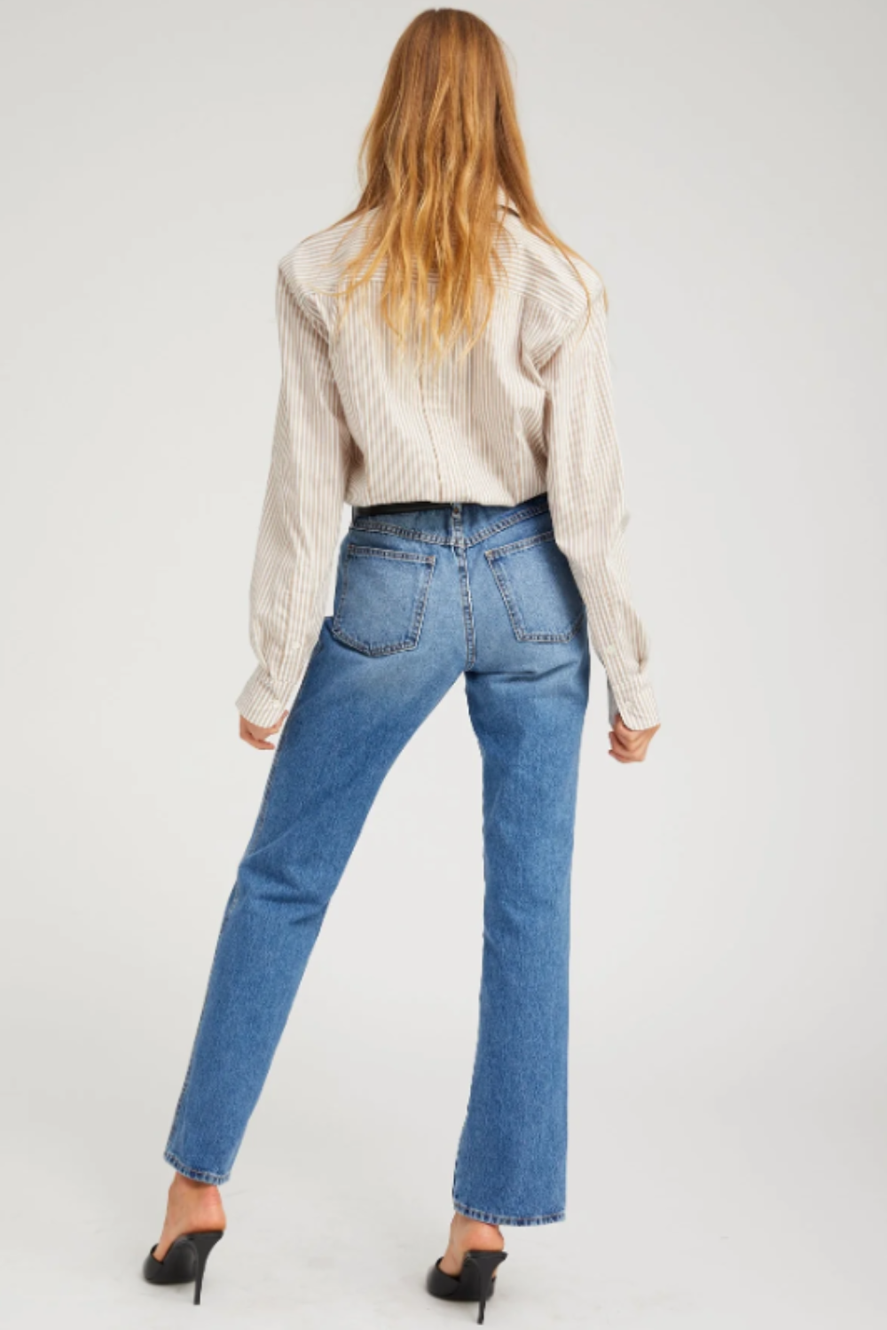 Model wearing SPRWMN Relaxed Straight Leg Denim rear view