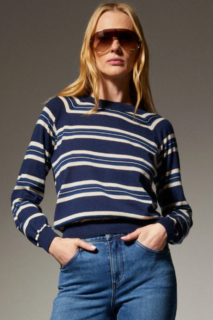 Model wearing SPRWMN Long Sleeve Striped Raglan Tee front view