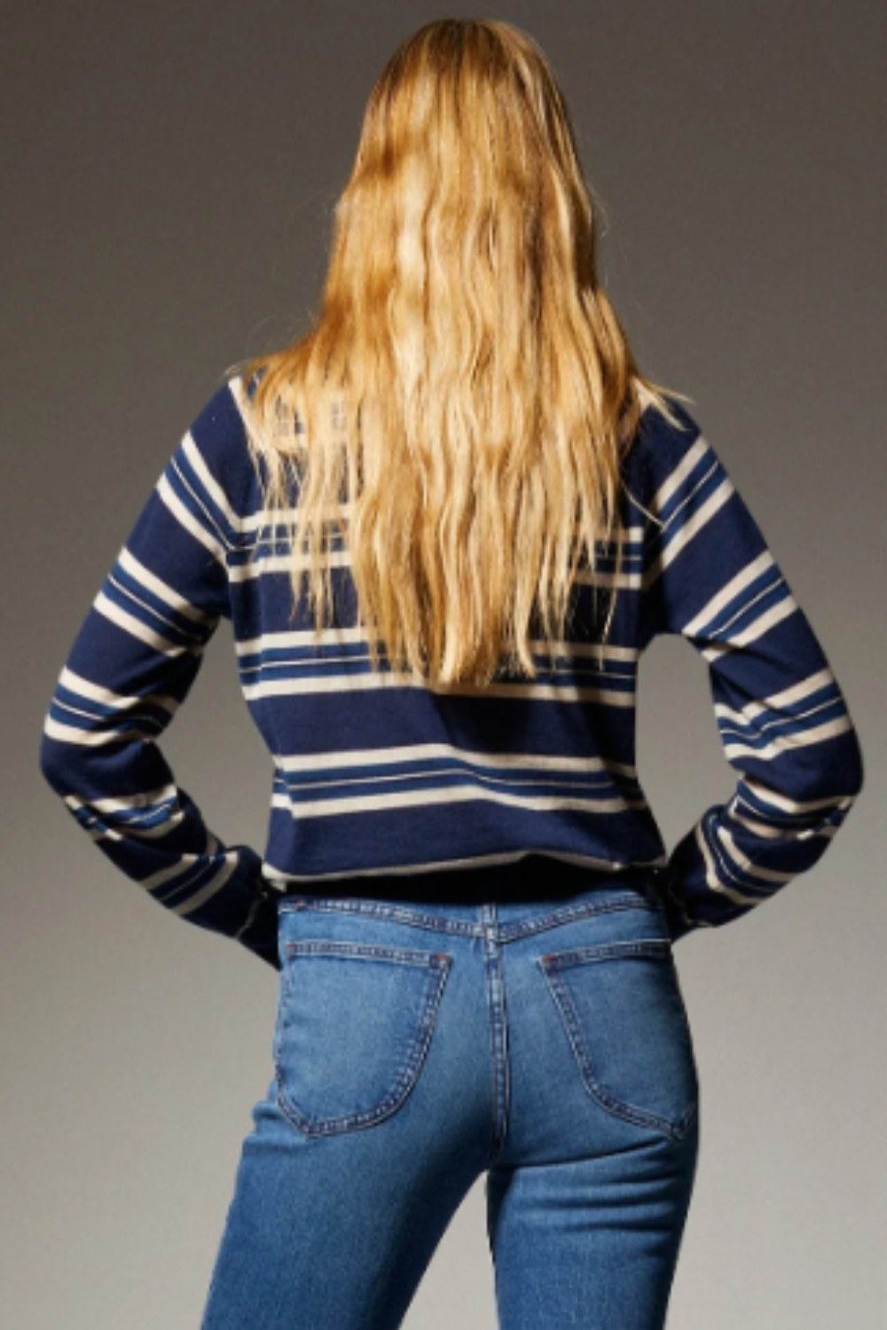 Model wearing SPRWMN Long Sleeve Striped Raglan Tee rear view