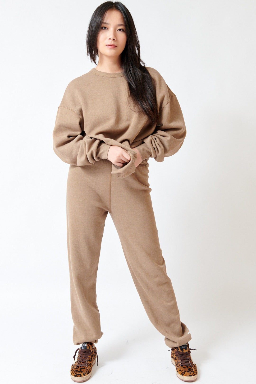 Lilly wearing SPRWMN Mini Logo Sweatpants front view