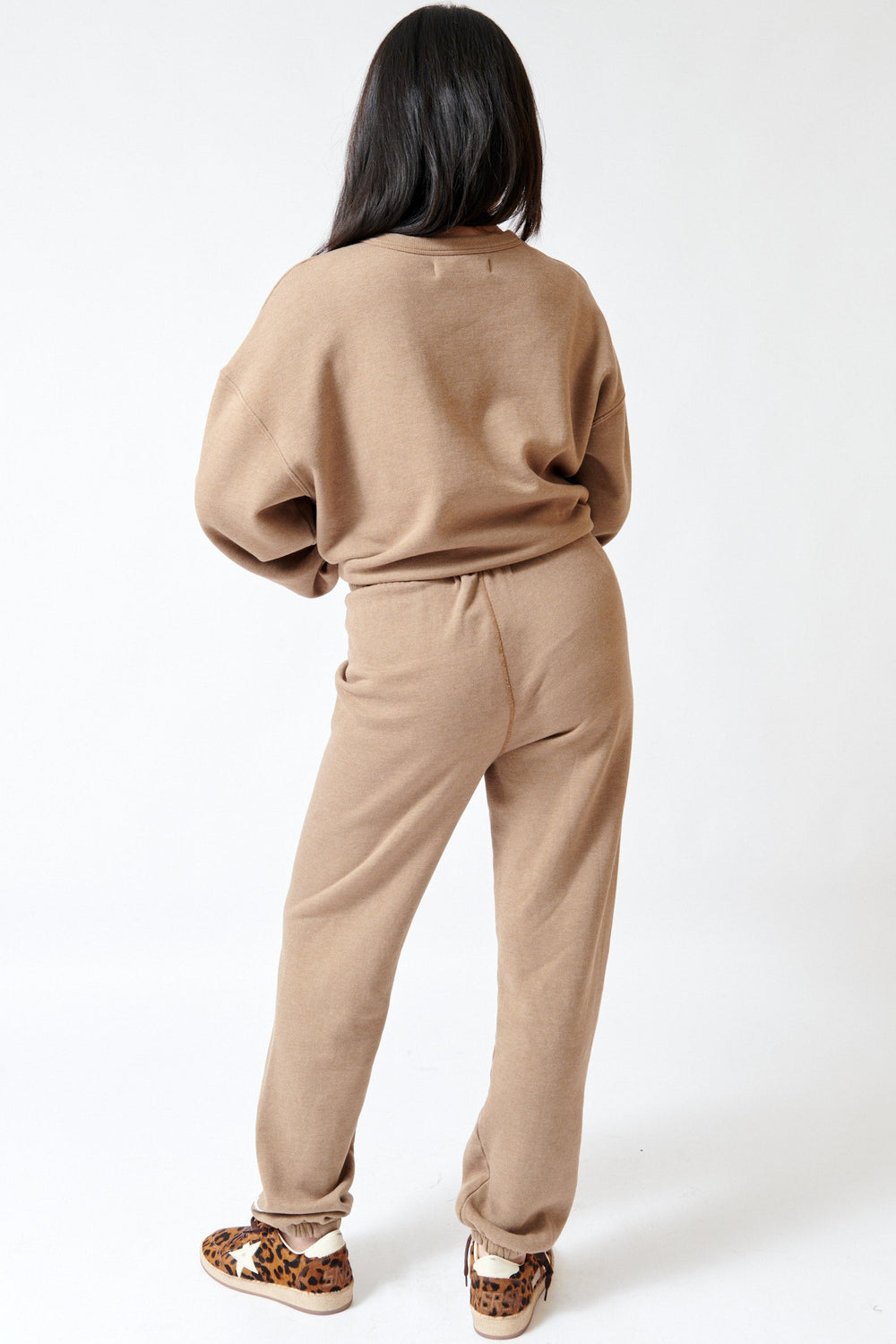 Lilly wearing SPRWMN Mini Logo Sweatpants rear view
