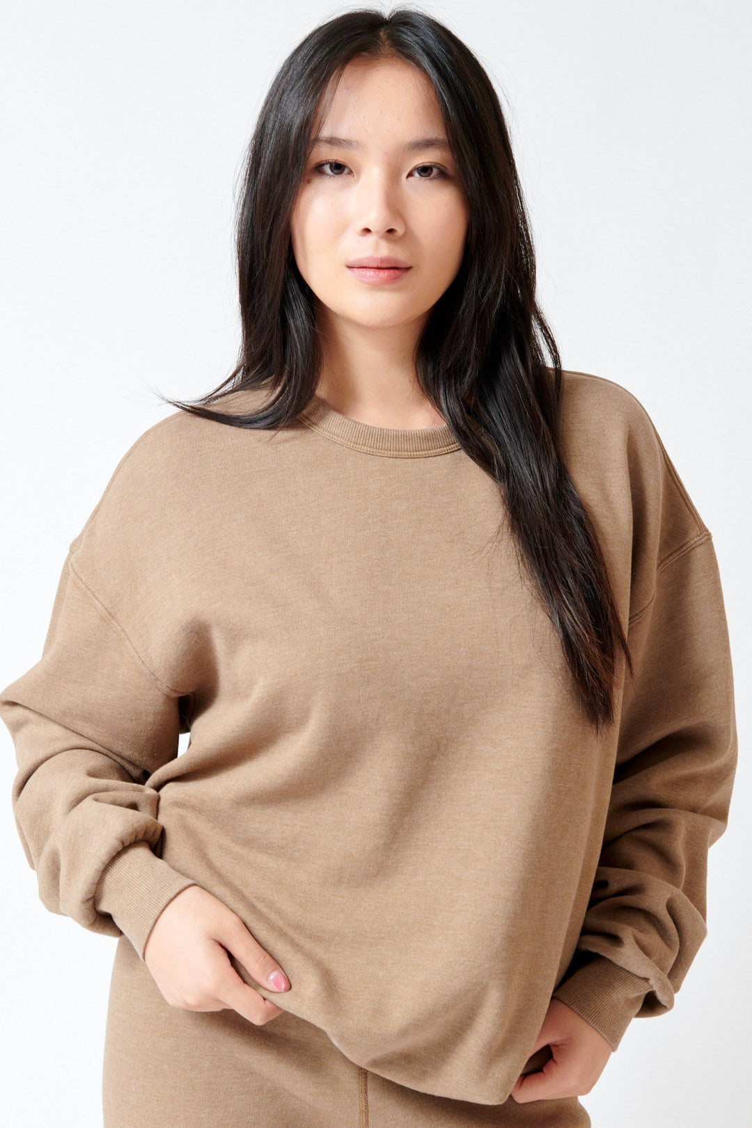 Lilly wearing SPRWMN Oversized Sweatshirt front view