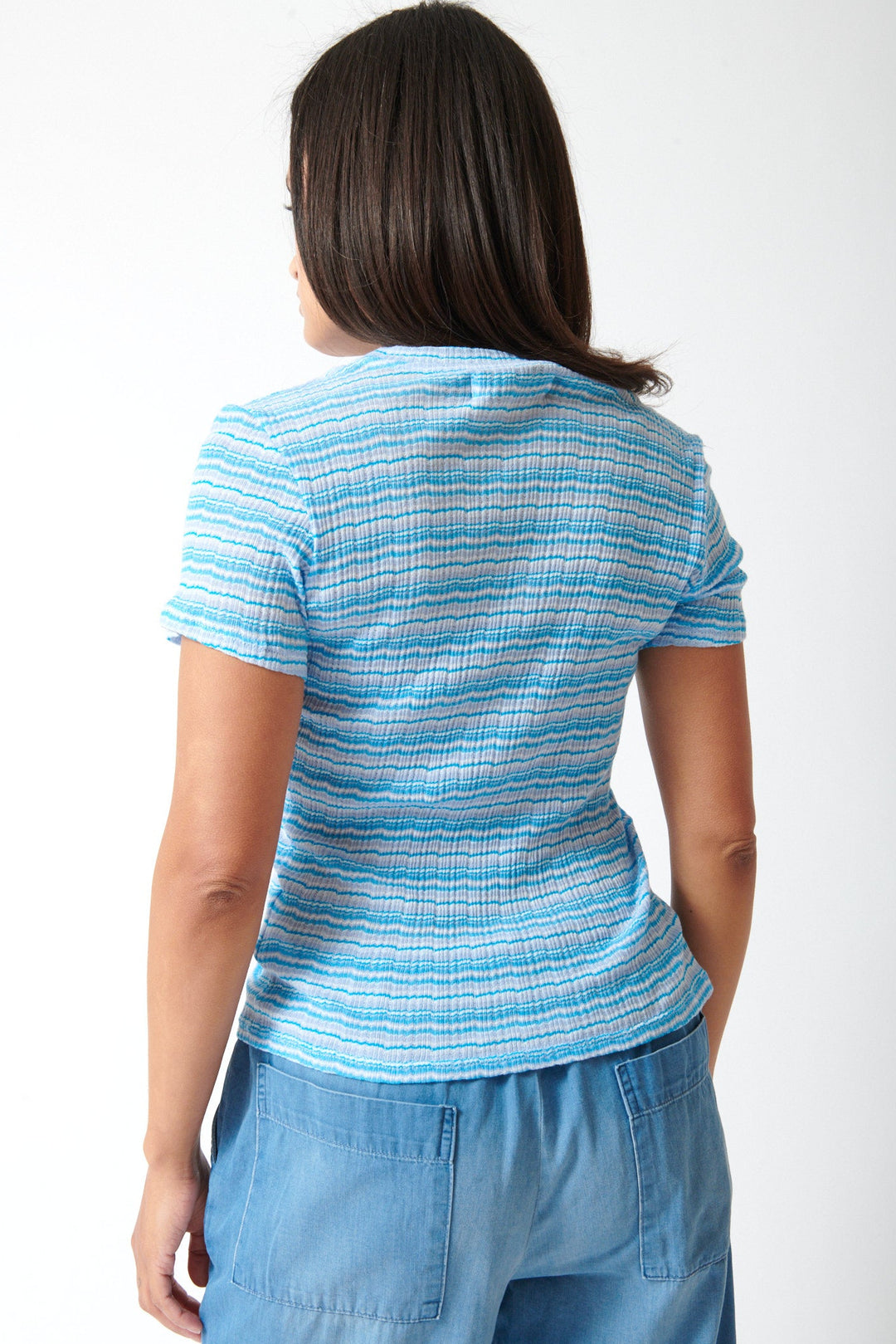 Amanda wearing SPRWMN Pointelle Baby Tee rear view