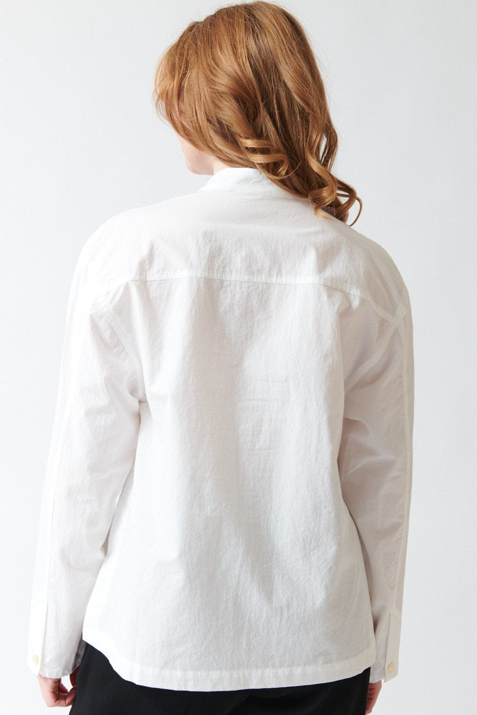 Model wearing Studio Nicolson Vega Typewriter Cotton Relaxed Shirt rear view