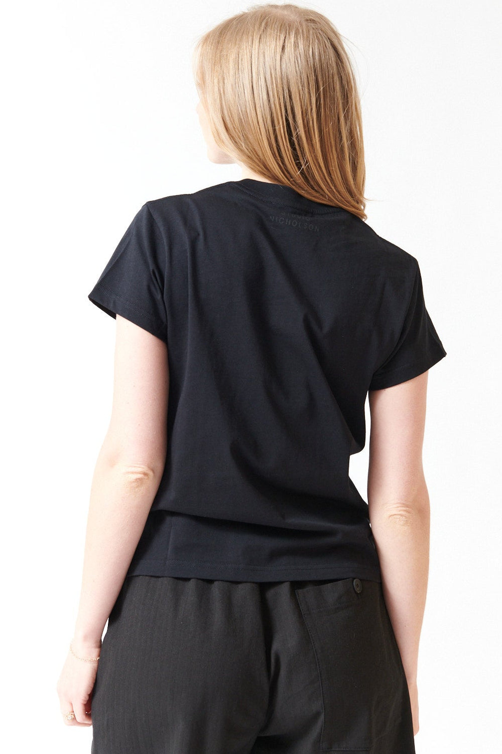 Madi wearing Studio Nicolson Marine Mid Weight Jersey Perfect Tee rear  view