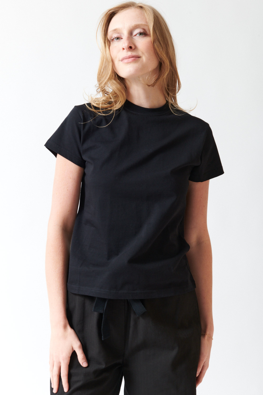Madi wearing Studio Nicolson Marine Mid Weight Jersey Perfect Tee front view