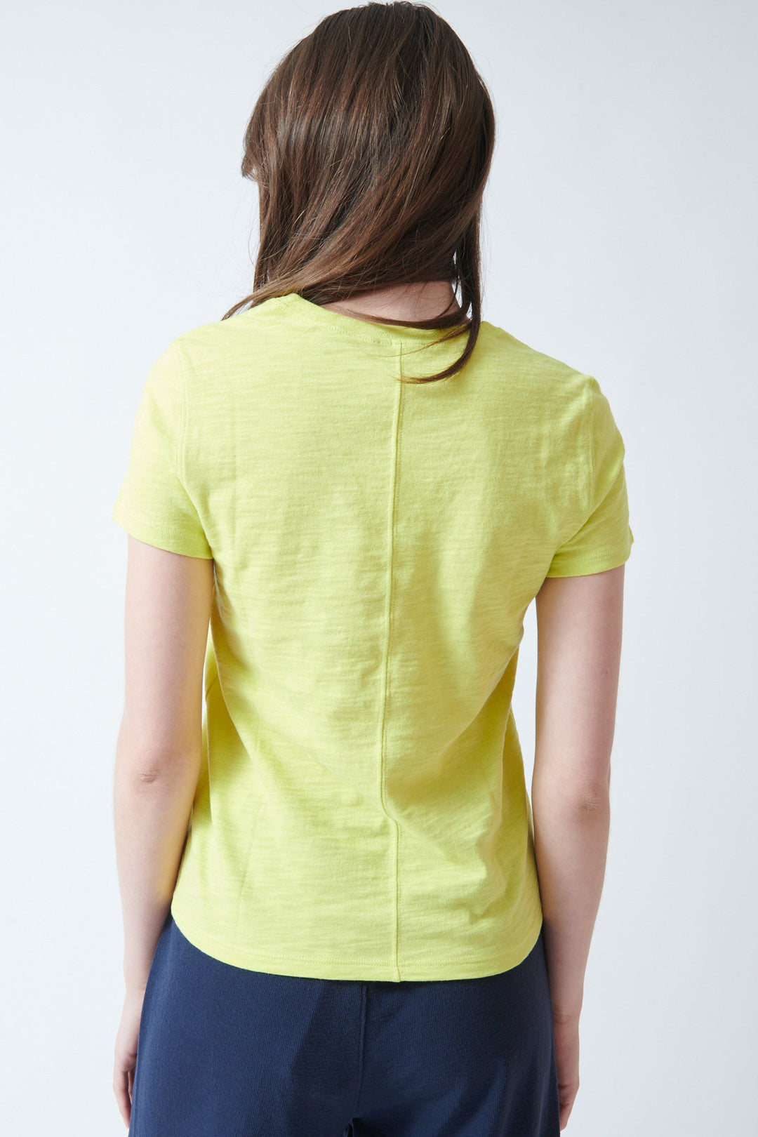 Angela wearing Lilla P Short Sleeve Back Seam V Neck Tee rear view