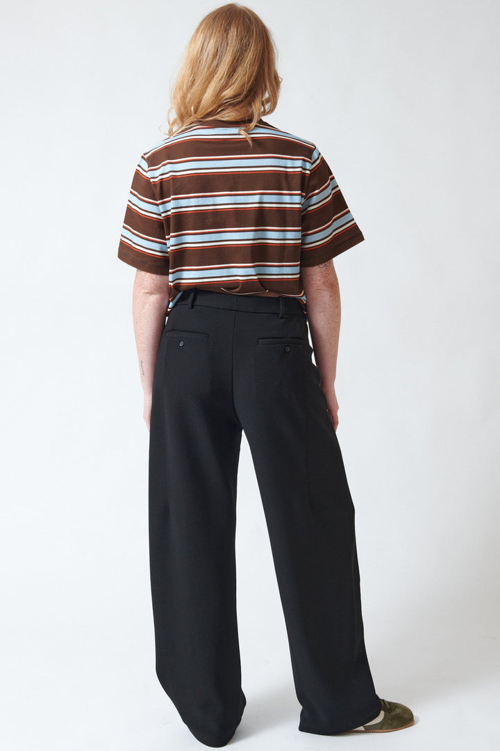 Waverly wearing Stine Goya Double Layer Crepe Sharp Pleat Pants rear view