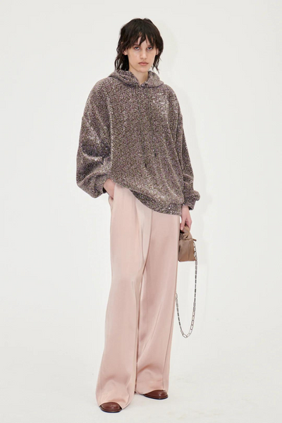 Model wearing Stine Goya Jesper Sequin Hooded Sweatshirt sold at grethen house ps24.