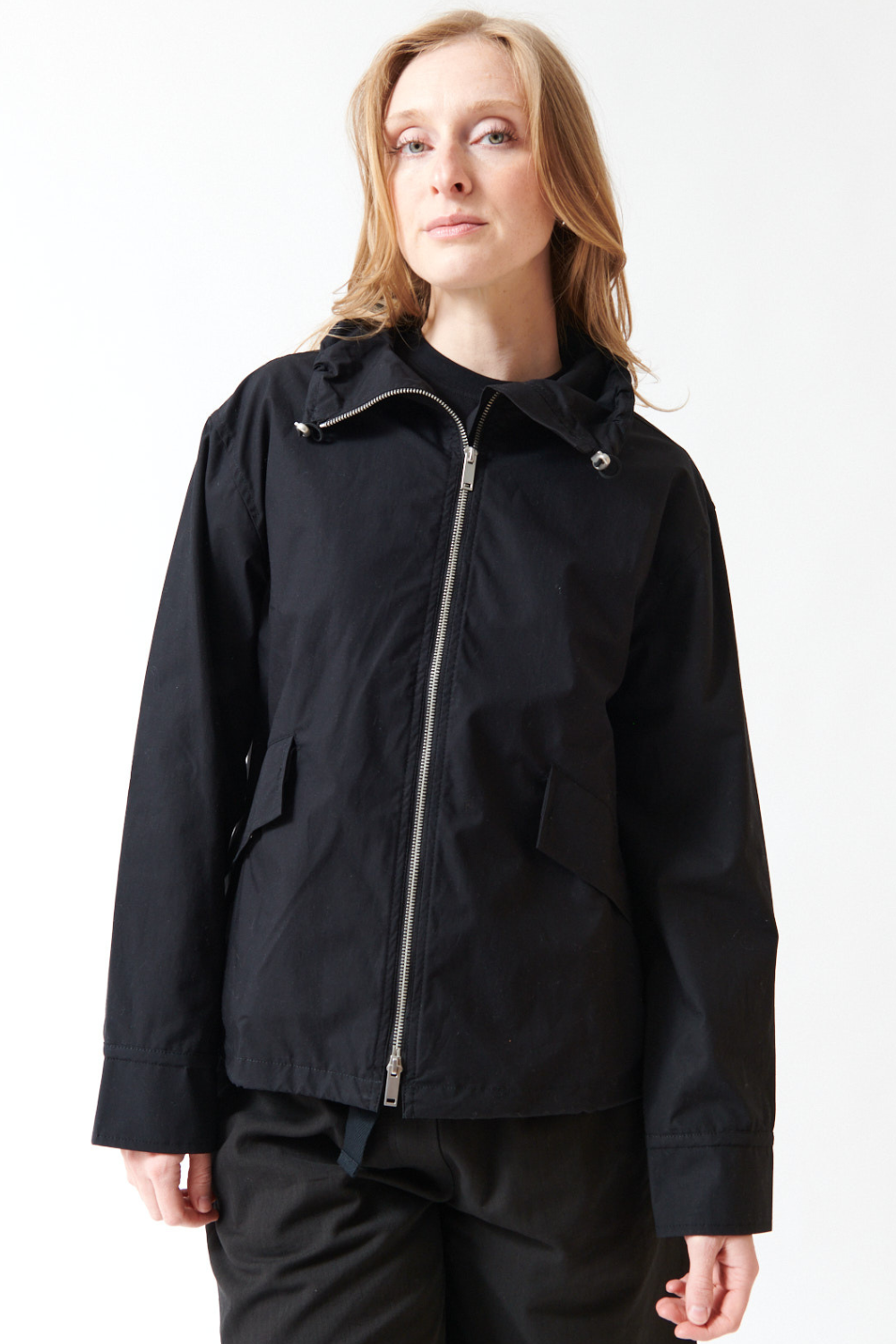 Madi wearing Studio Nicolson Lismore Noisy Cotton Zip Thru Jacket front view