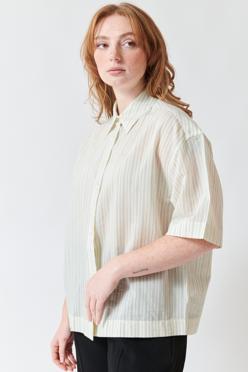 Waverly wearing Studio Nicolson Merle Cotton Silk Stripe Short Sleeve Shirt front view