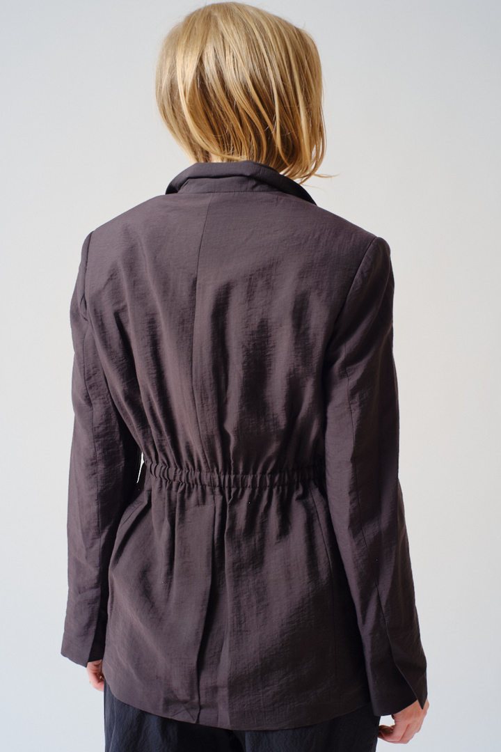 Madi wearing TELA-Nadine Jacket Coffee rear view