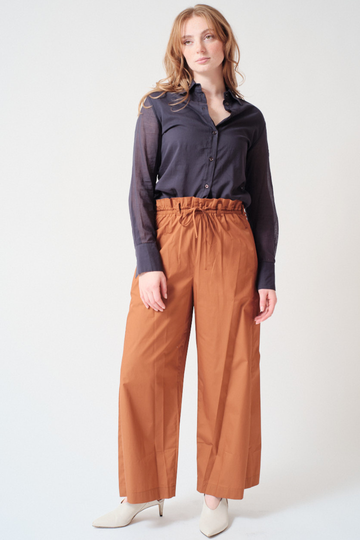 Waverly wearing Tela Lucio Trousers front view