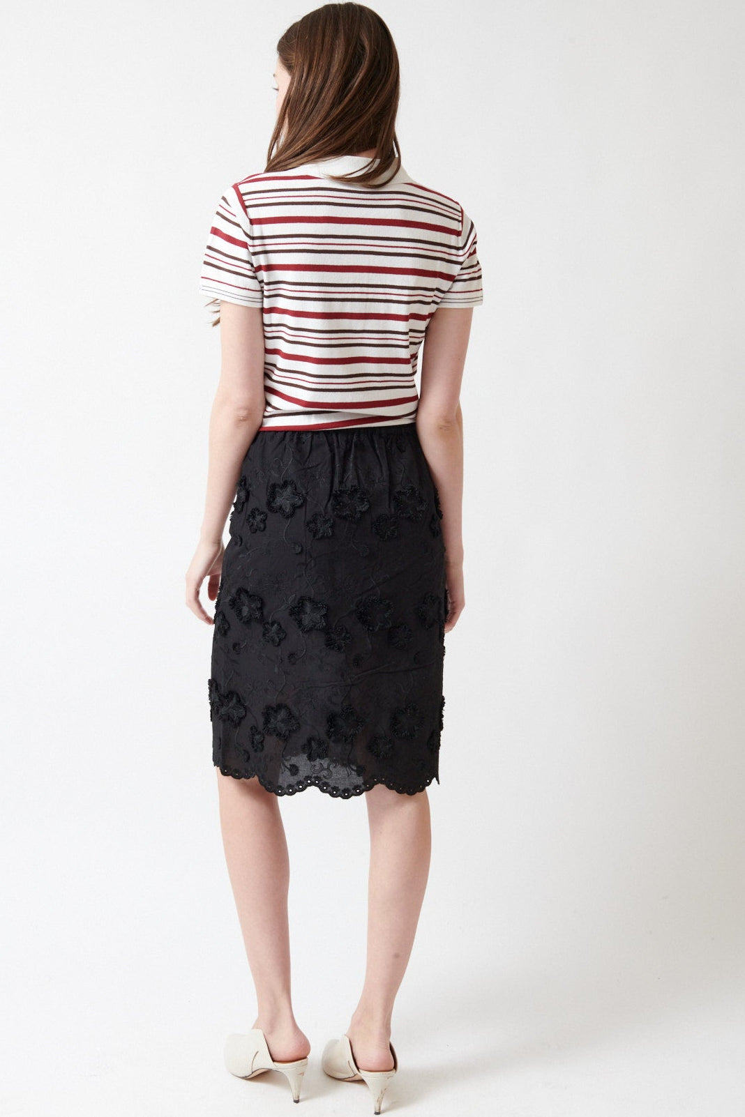 Angela wearing The Garment Fleur Slip Skirt rear view