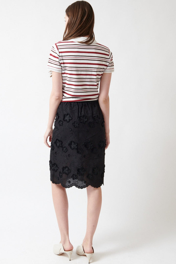 Angela wearing The Garment Fleur Slip Skirt rear view