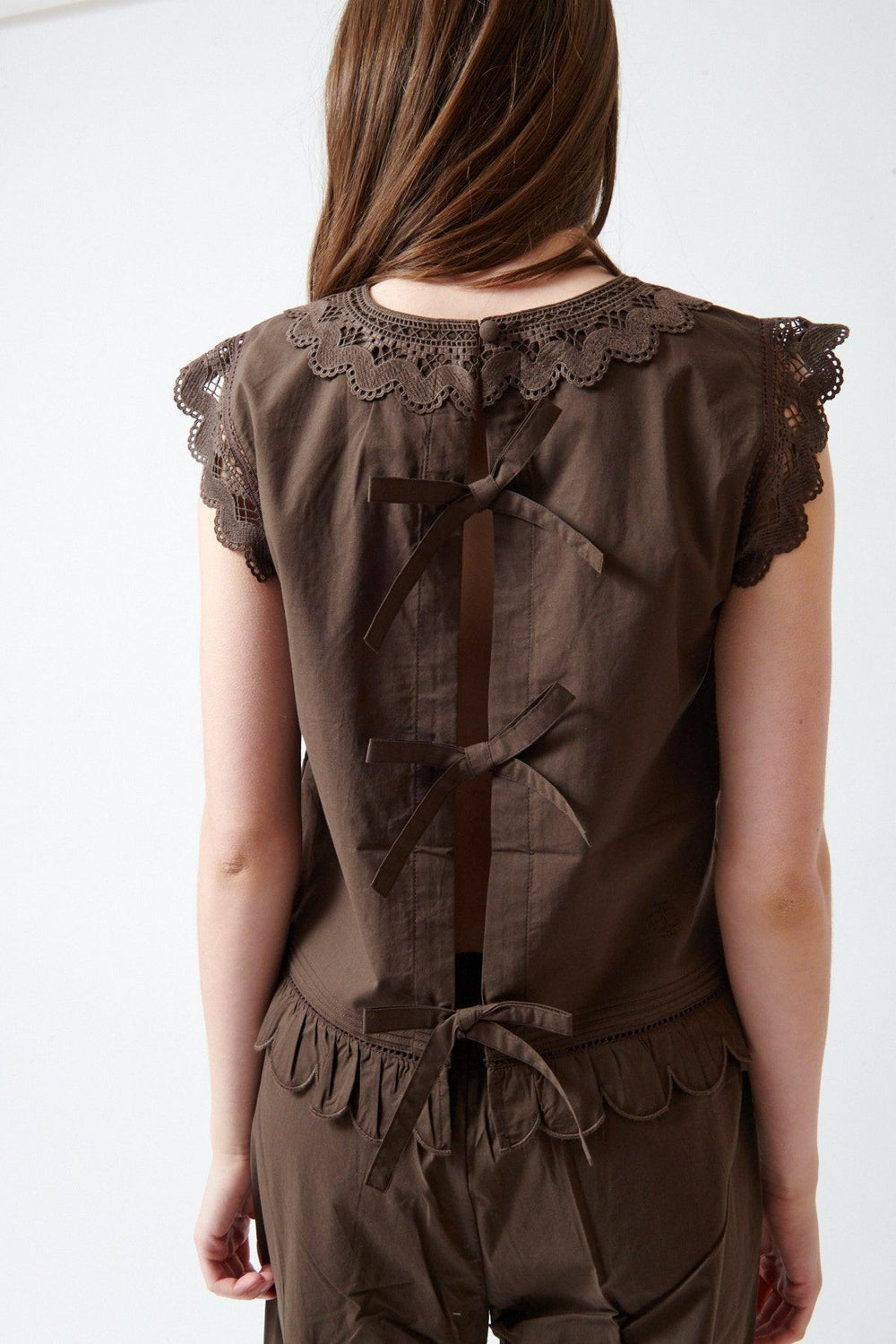 Angela wearing The Garment Kirsten Cloth Top rear view
