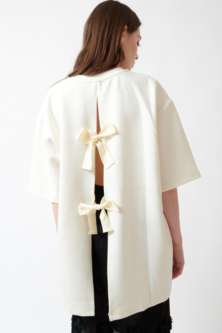 Angela wearing The Garment TG Bow Tee rear view