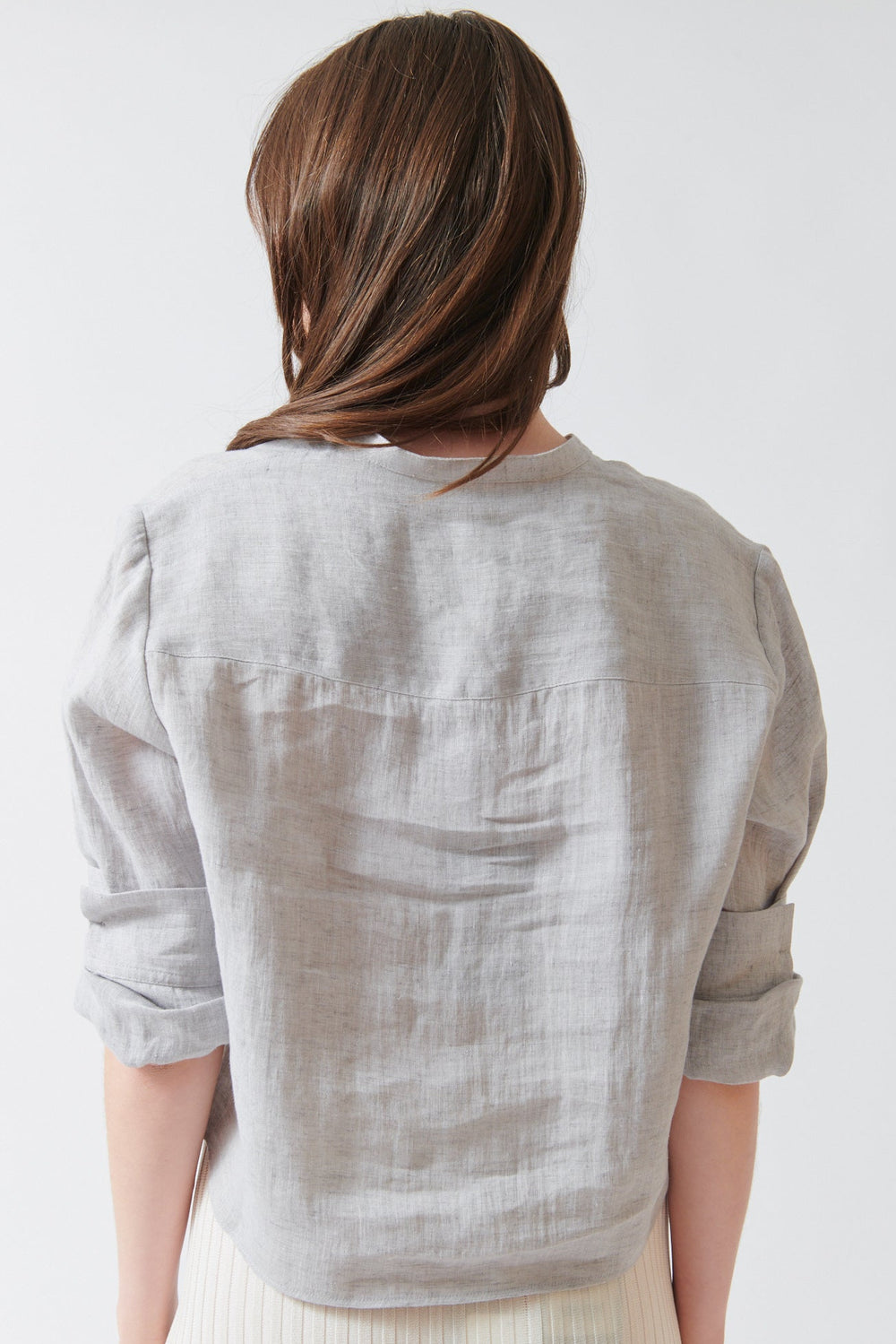 Angela wearing TWP Three Quarter Sleeve Stand Collar Shirt Light Heather Grey rear view