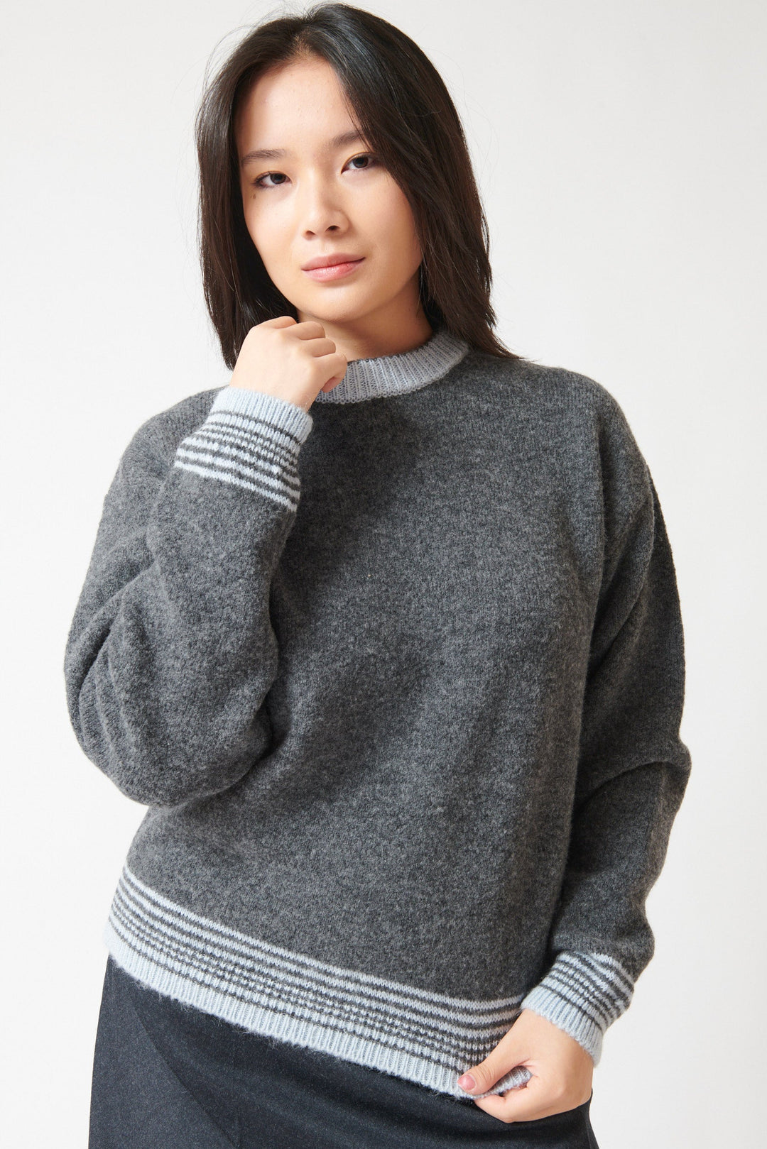 Lilly wearing Tela Engin Sweater front view