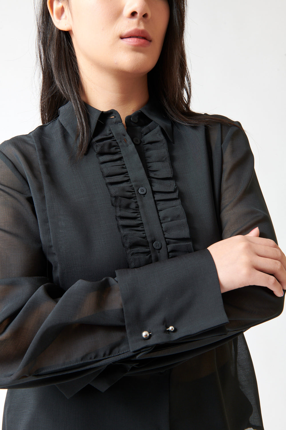 Lilly wearing Tela Opal Shirt front detail view