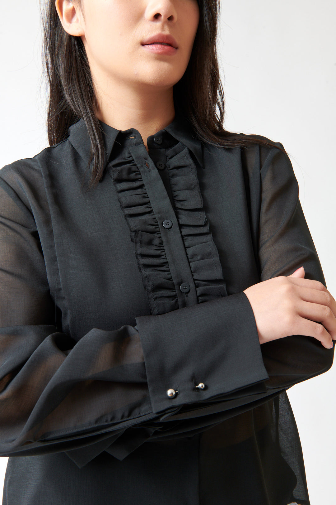 Lilly wearing Tela Opal Shirt front detail view