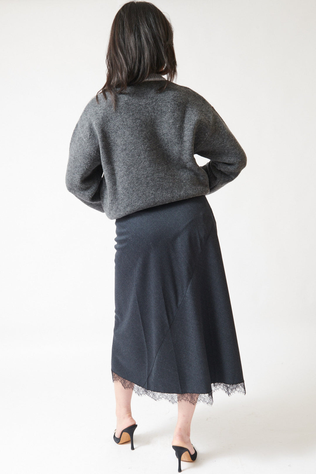 Lilly wearing Tela Tina Skirt rear view