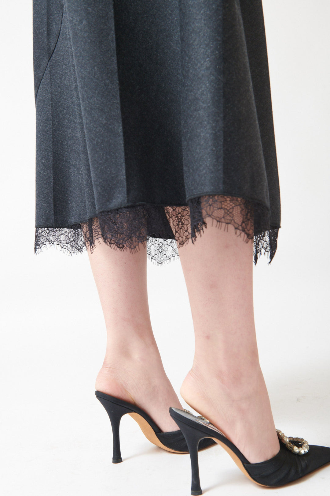 Lilly wearing Tela Tina Skirt detail bottom view
