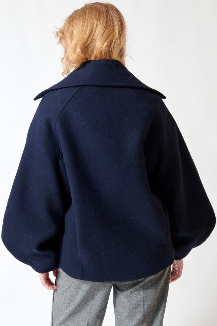 Waverly wearing Tela Seth Outer Jacket rear view