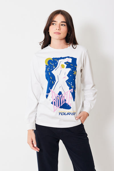 Front view of model wearing long sleeve white tee with David Bowie tour graphic