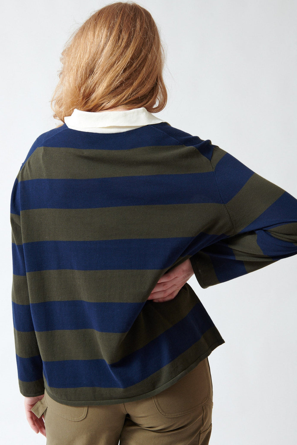 Waverly wearing The Great The Academy Polo Sweater rear view