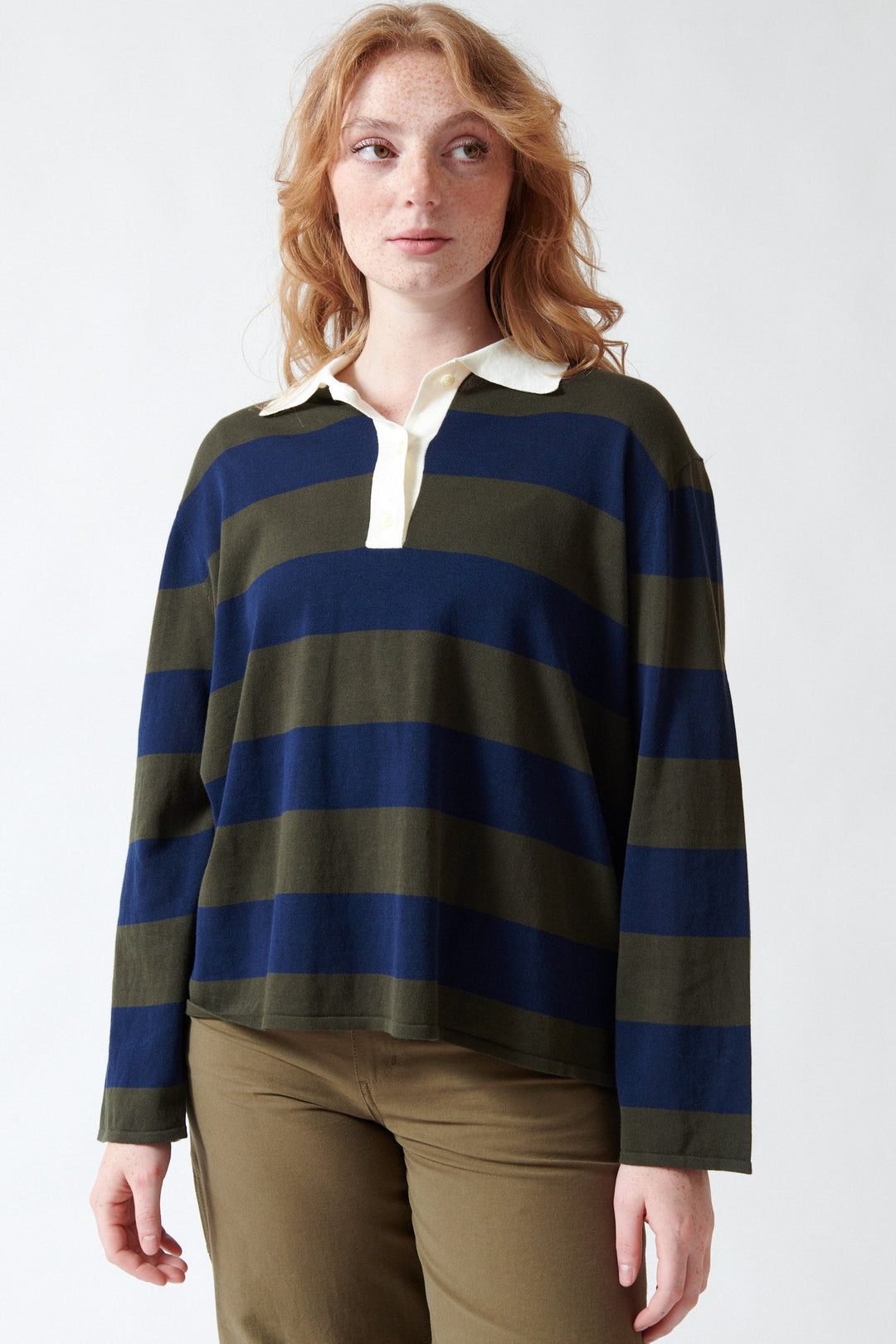 Waverly wearing The Great The Academy Polo Sweater front view