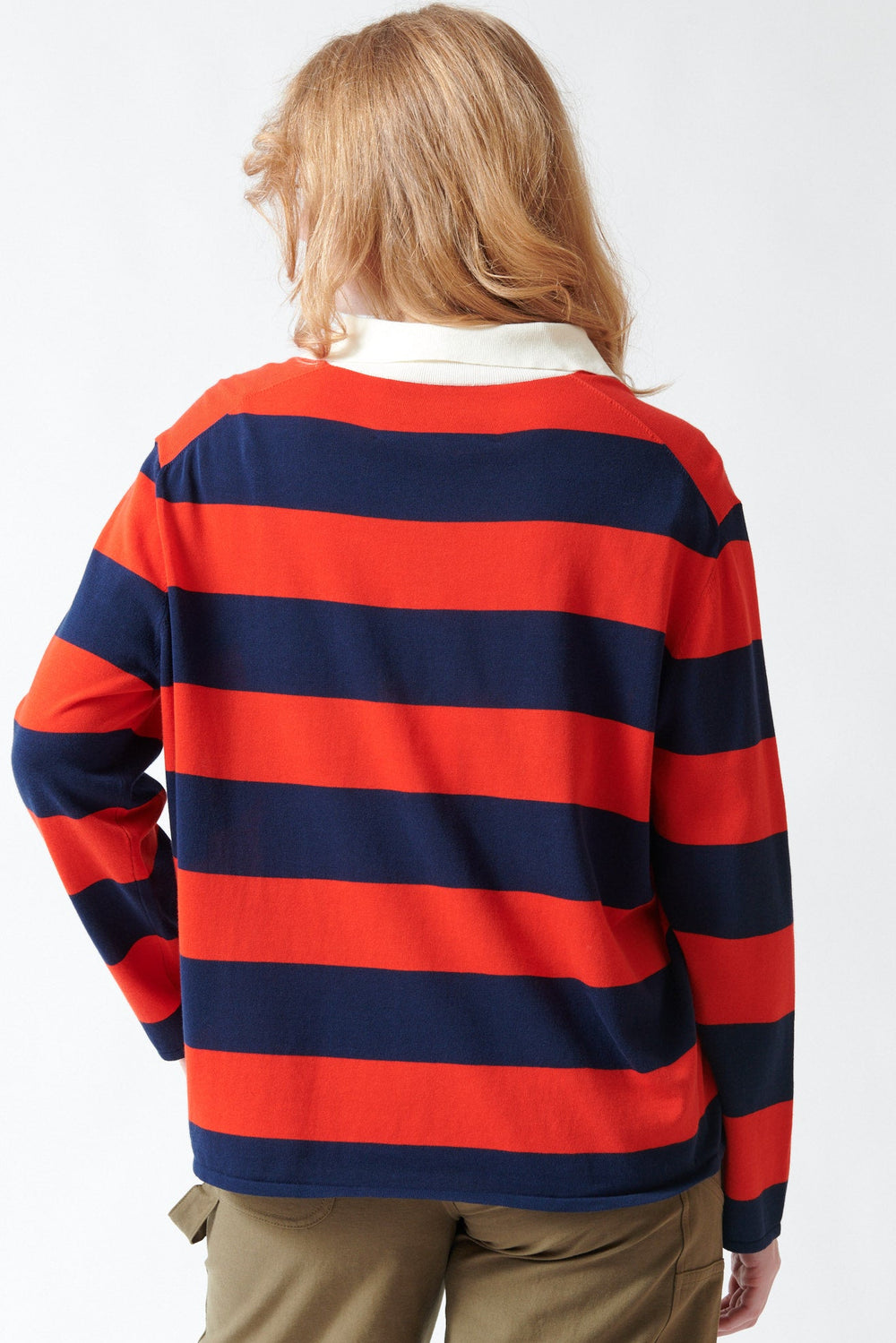 Waverly wearing The Great The Academy Polo Sweater rear view