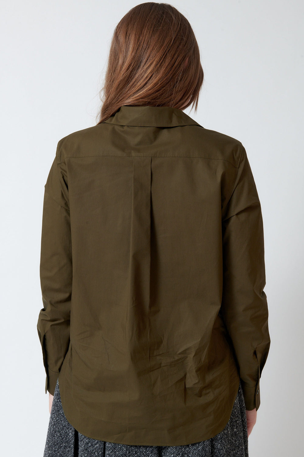 Model wearing Mantu Tied High Neck Poplin Shirt rear view