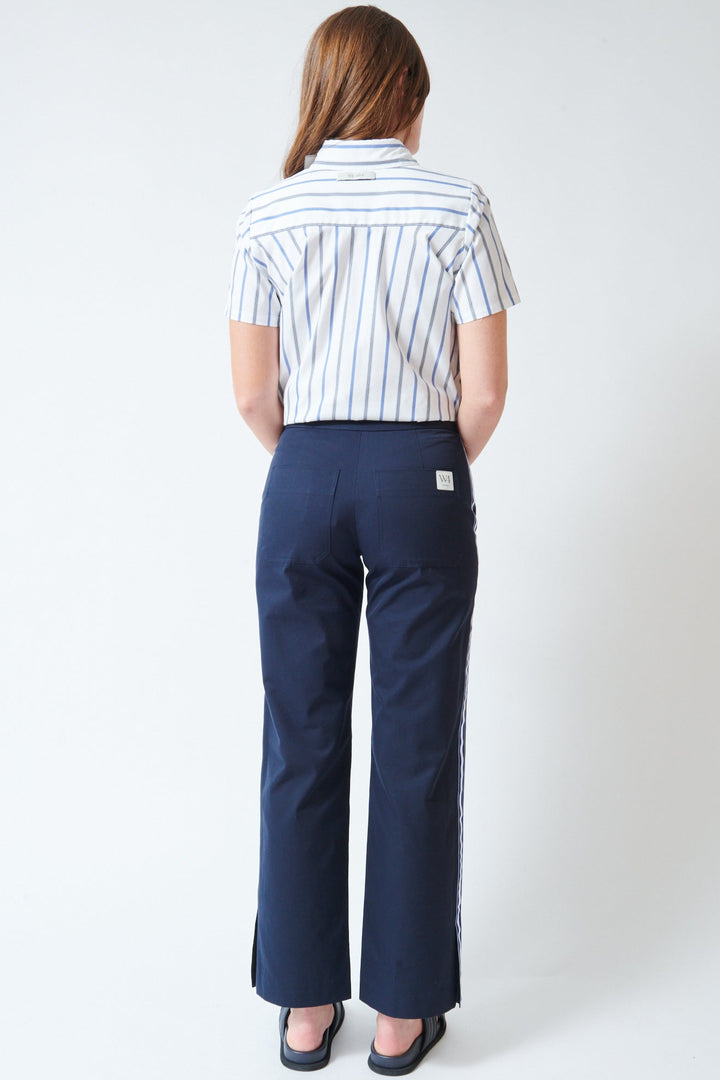 Julia wearing WE-AR4 The Street Pant Navy rear view