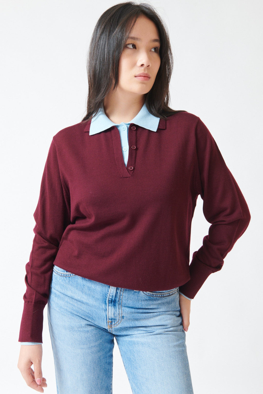 Model wearing White + Warren Superfine Merino Layered Polo Black Cherry Light Blue Trim front view