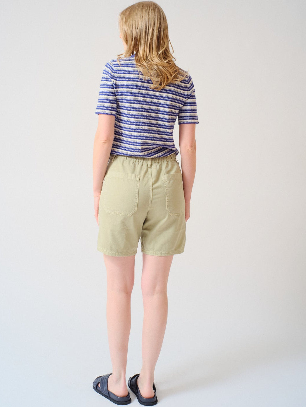 Madi wearing Xirena Toby Short rear view