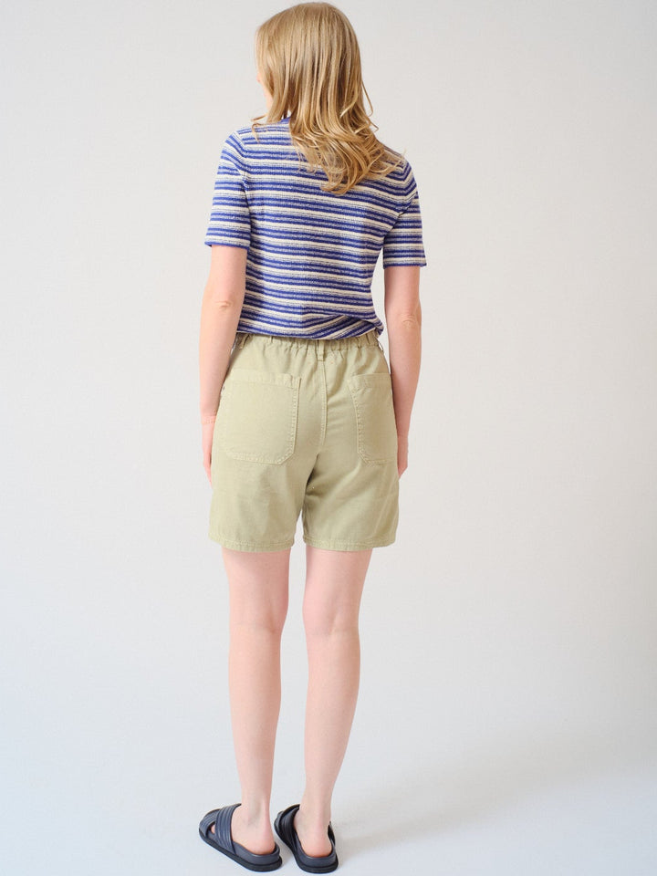 Madi wearing Xirena Toby Short rear view