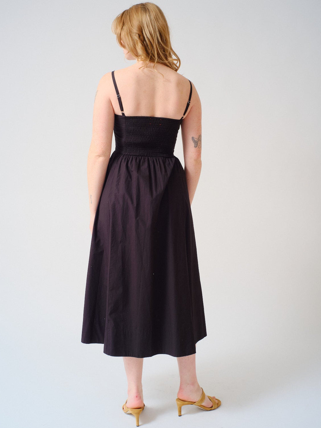 Waverly wearing Xirena Bardot Dress rear view